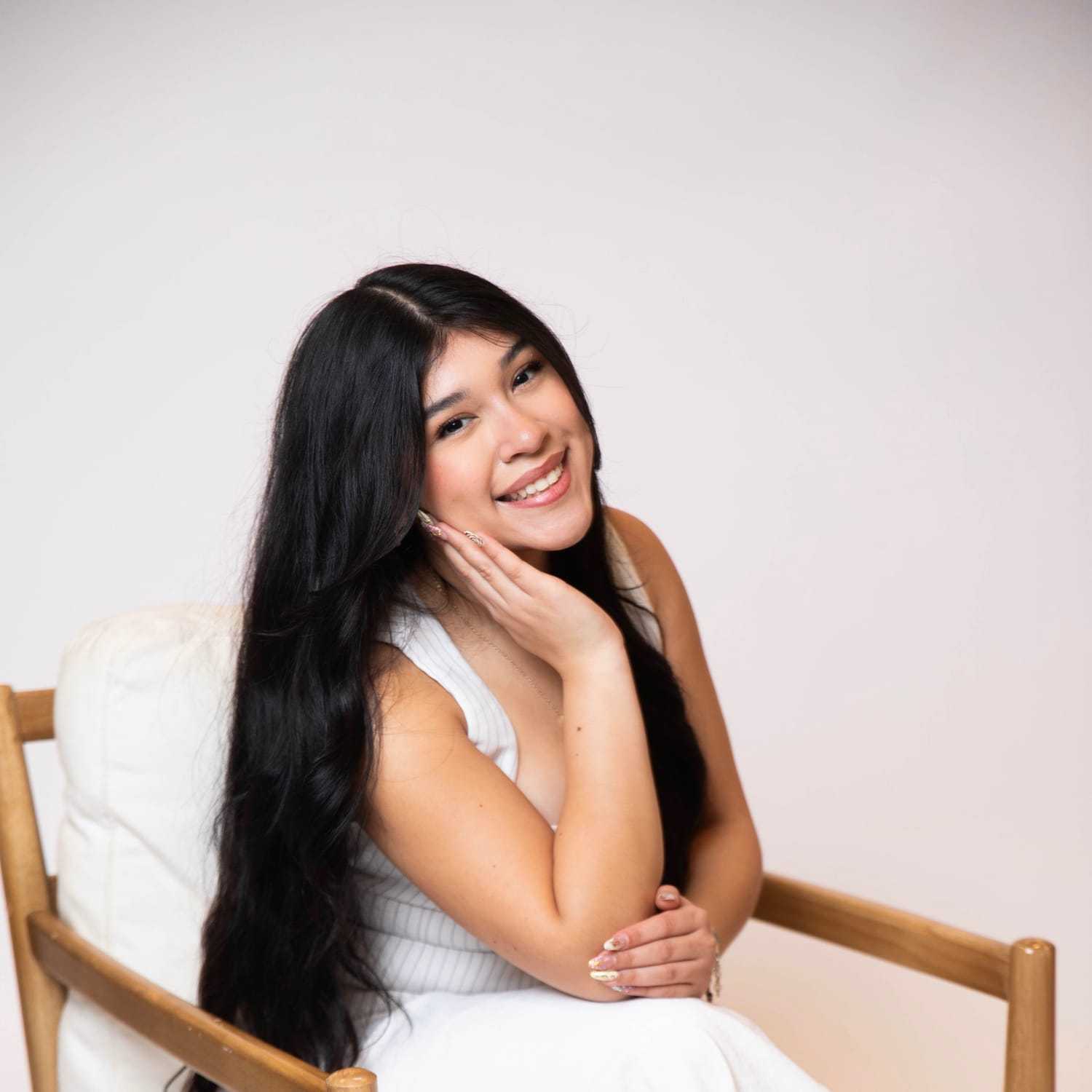 Portrait of Angie Loredo, a professional stylist at Onda Salon, showcasing their expertise and style.